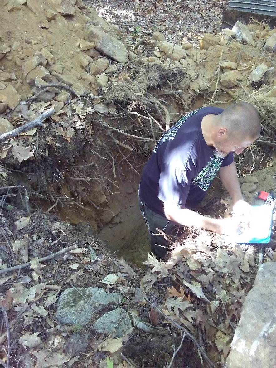On-site soil evaluation, test pit — Great North Woods Septic Design field photo